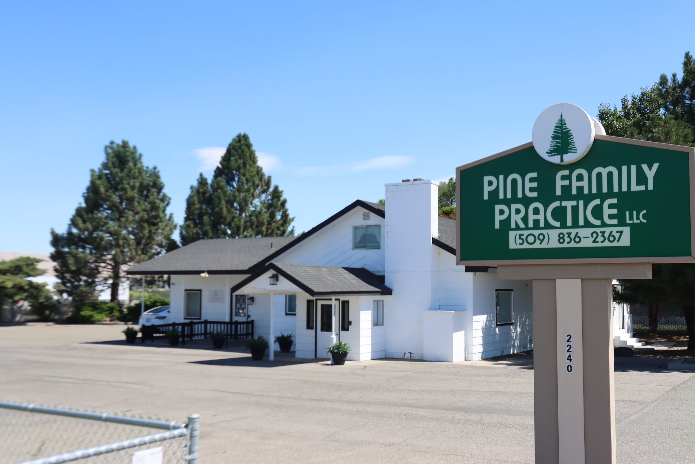 The Pine Family Practice building and sign at 2240 East Lincoln Avenue in Sunnyside
